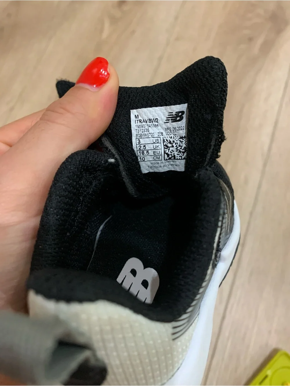 LIKE NEW New Balance baby Black and White Velcro Athletic Sneakers